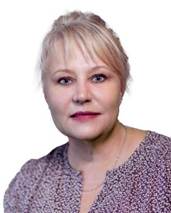 A person with blonde hair wearing a floral shirt AI-generated content may be incorrect.