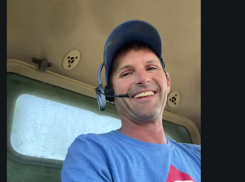 Craig Meeker smiling in combine
