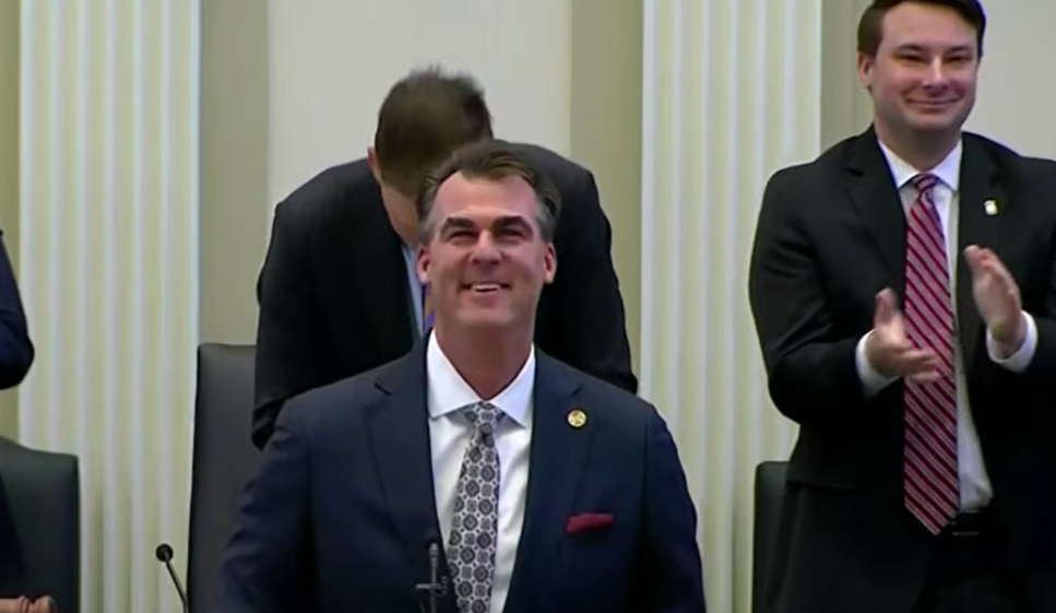 Kevin Stitt smiles